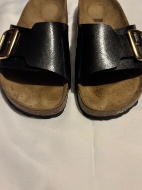Birkenstock Black Slide Sandals with Gold Buckles